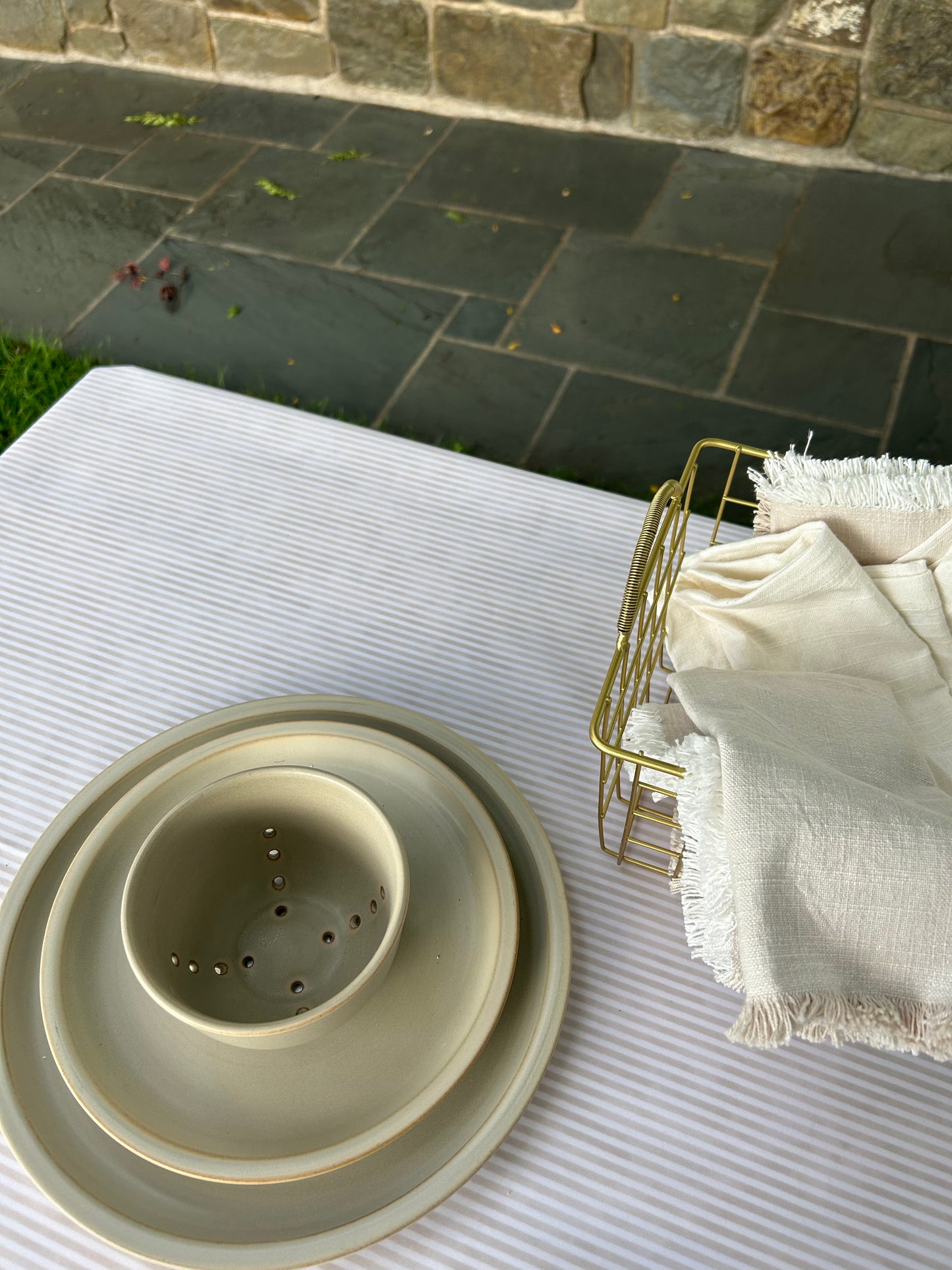 White and tan striped wipeable spill proof party tablecloth